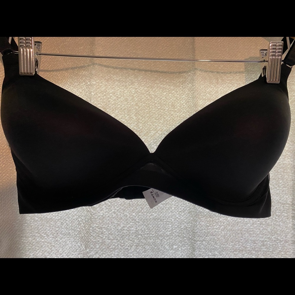 Warners 34D black bra with middle mesh piece.